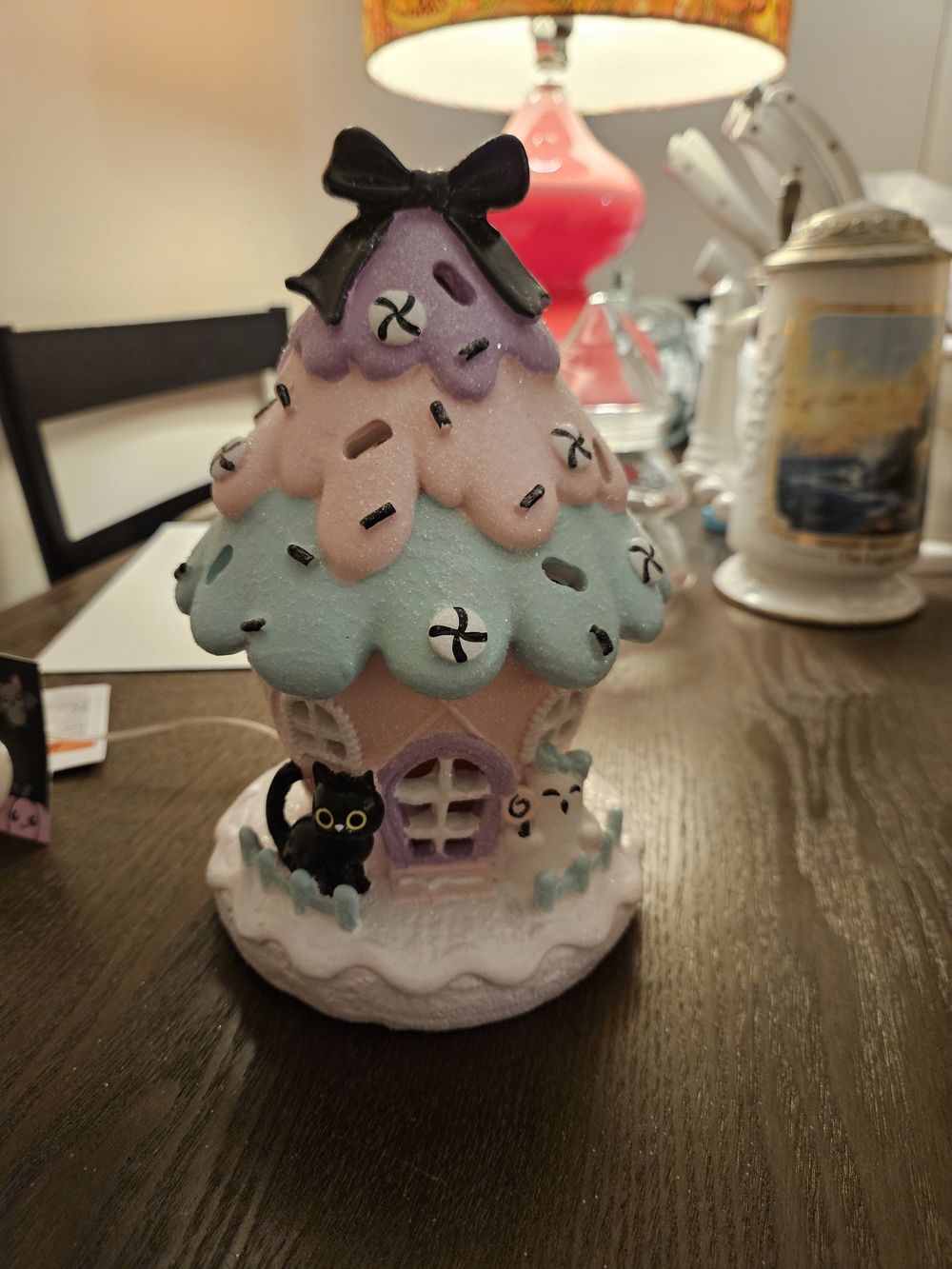Whimsical Pastel Fairy House Figurine with Black Cat